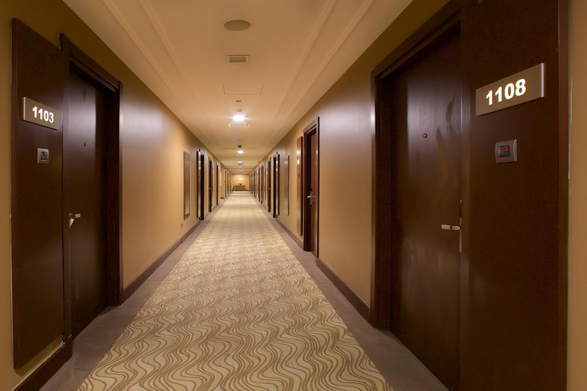 Ramada By Wyndham Istanbul Merter Exterior photo A typical hotel corridor
